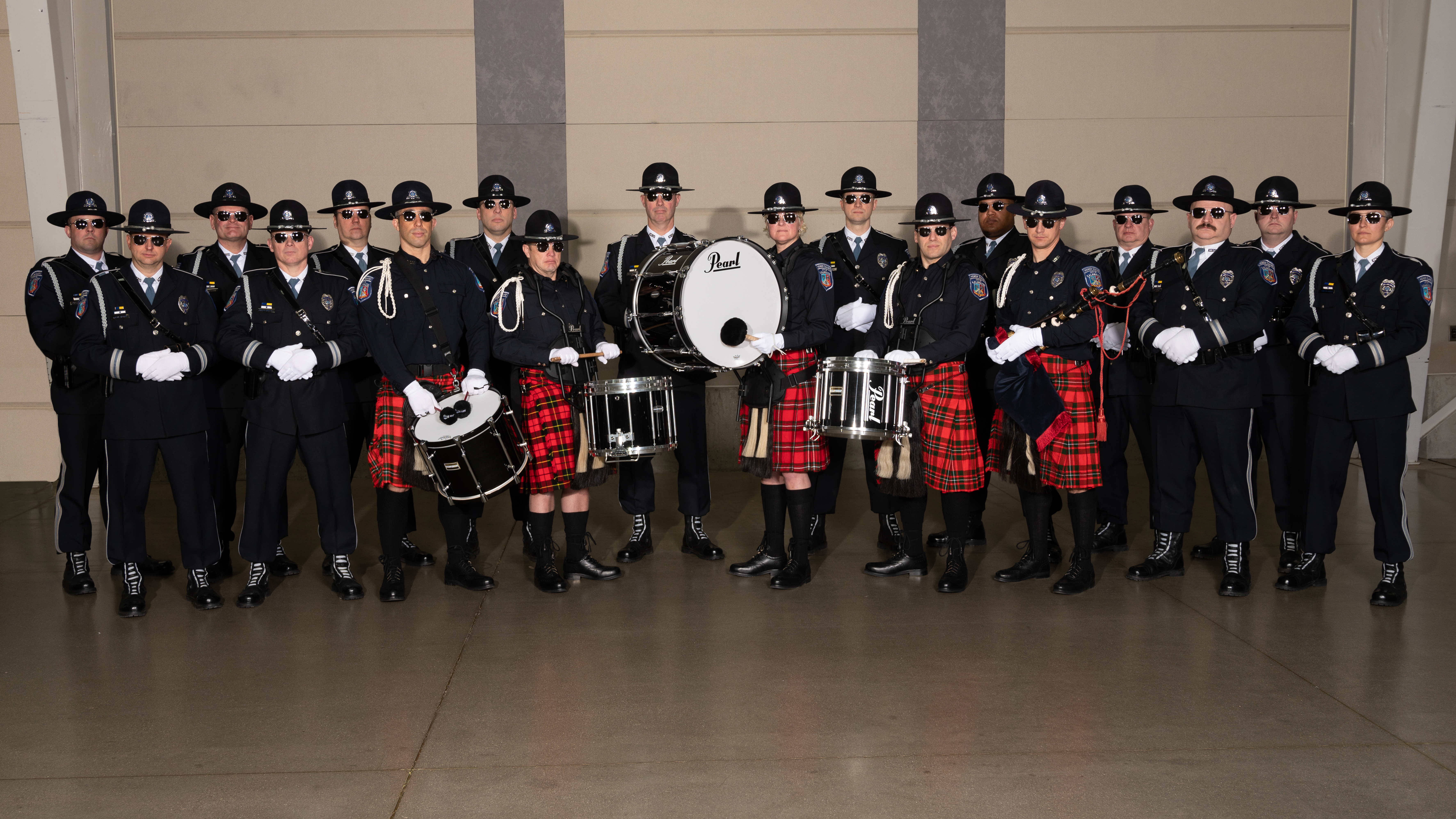 A group photo of the KDPS Pipe and Drum Team